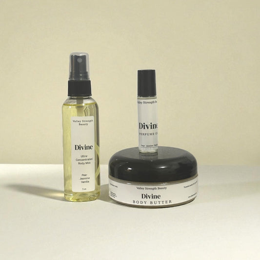 Three skincare products labeled 'Divine' on a beige background